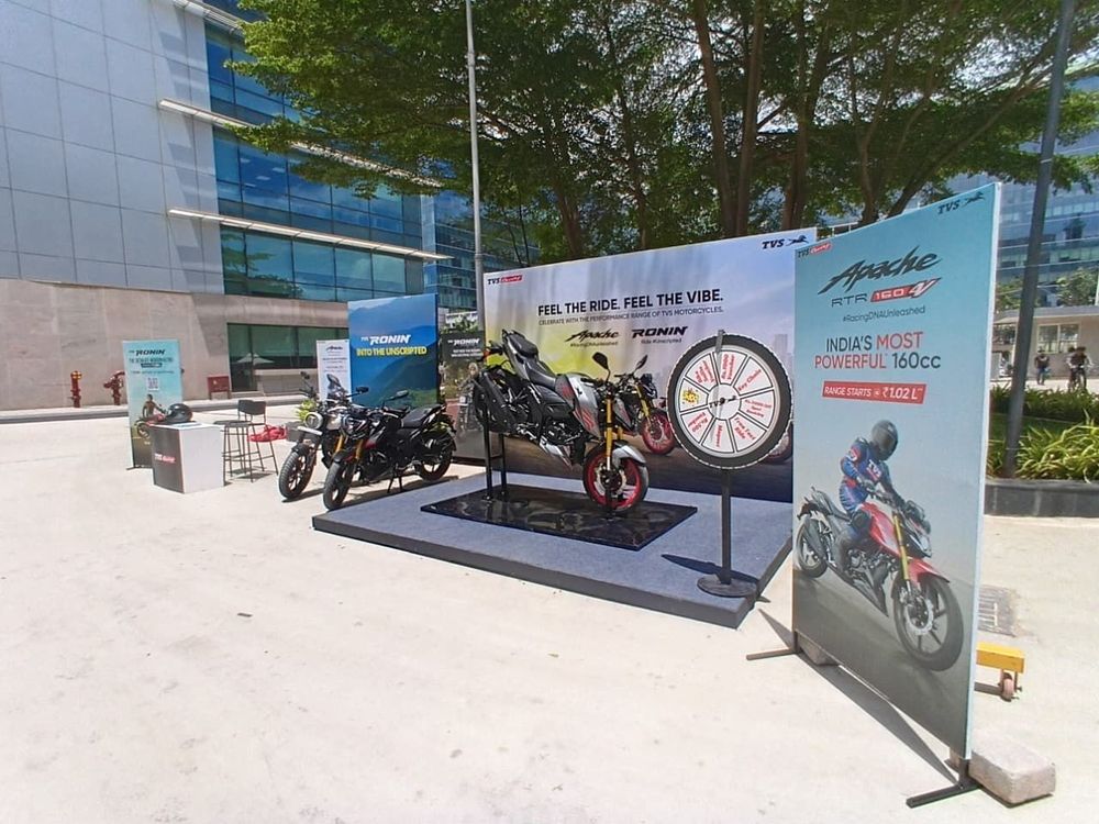 TVS Apache and Ronin bike display with a prize wheel activation